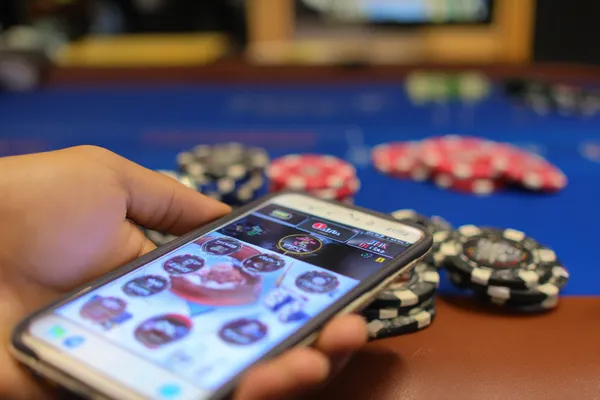 A confident dealer surrounded by casino chips inviting players to access their JILI7979 account, reflecting quick and easy login options.